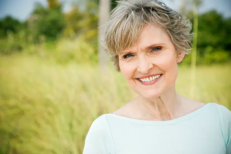 Smiling woman enjoying the outdoors