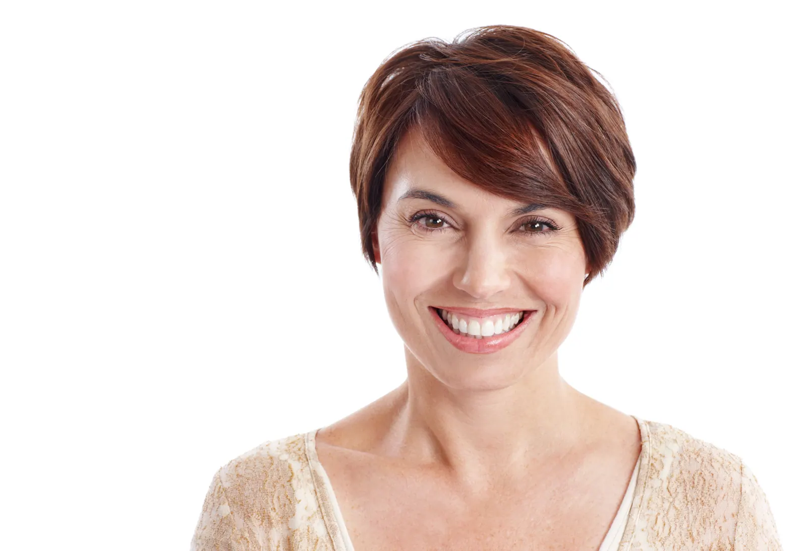 Smiling woman with short brown hair posing against